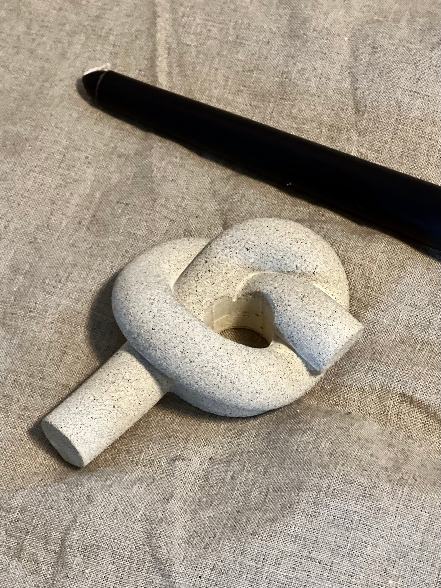 Knot stone candle holder